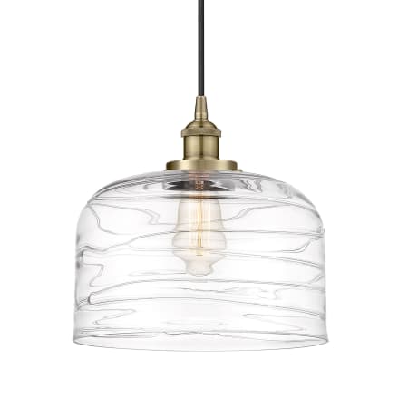 A large image of the Innovations Lighting 616-1PH-12-12-L Bell Pendant Antique Brass / Clear Deco Swirl