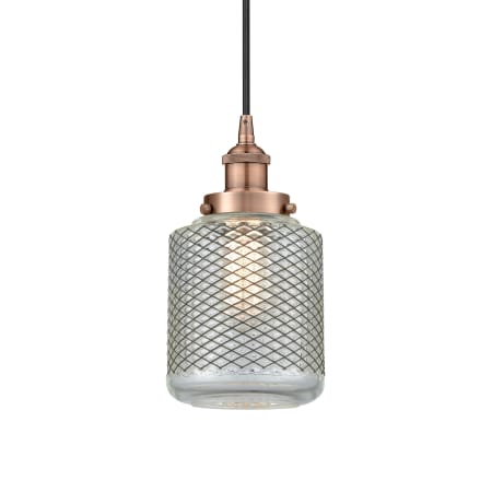 A large image of the Innovations Lighting 616-1PH-12-6 Stanton Pendant Antique Copper / Clear Wire Mesh