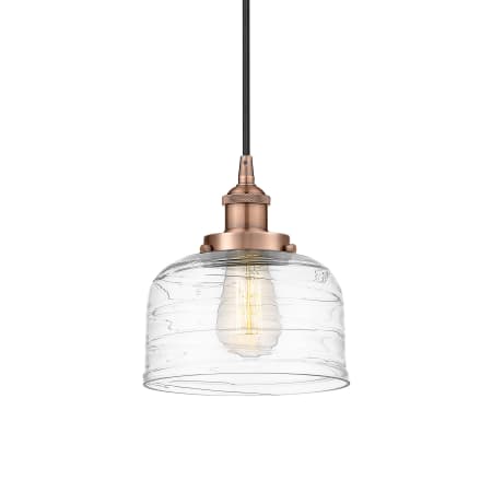 A large image of the Innovations Lighting 616-1PH-10-8 Bell Pendant Antique Copper / Clear Deco Swirl