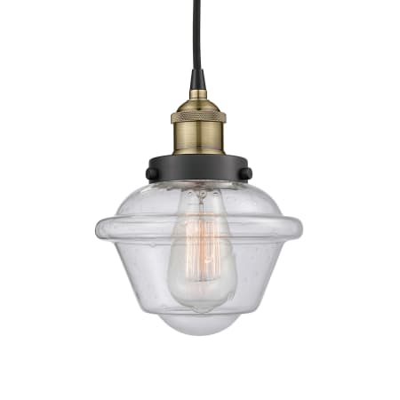 A large image of the Innovations Lighting 616-1PH-10-7 Oxford Pendant Black Antique Brass / Seedy