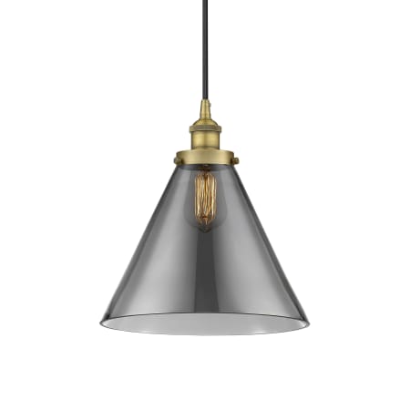 A large image of the Innovations Lighting 616-1PH-15-12-L Cone Pendant Brushed Brass / Plated Smoke