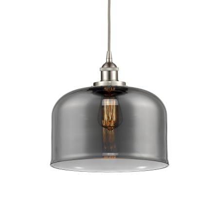 A large image of the Innovations Lighting 616-1PH-12-12-L Bell Pendant Brushed Satin Nickel / Plated Smoke