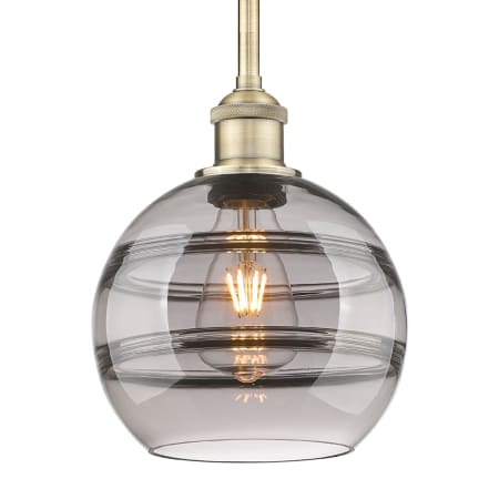 A large image of the Innovations Lighting 616-1S 9 8 Rochester Pendant Antique Brass / Clear