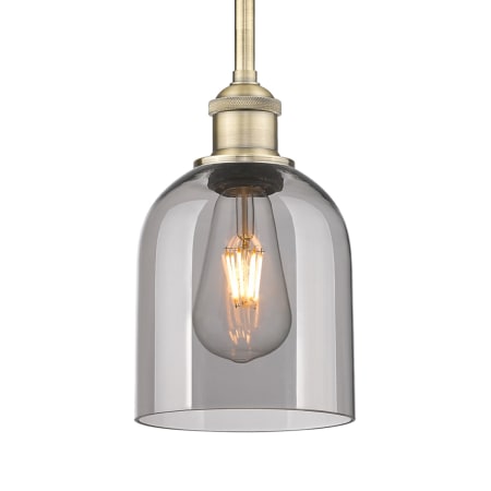 A large image of the Innovations Lighting 616-1S 9 6 Bella Pendant Antique Brass / Light Smoke