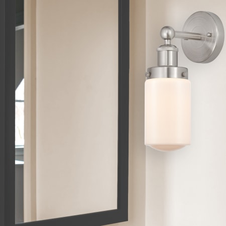 A large image of the Innovations Lighting 616-1W-10-7 Dover Sconce Alternate Image