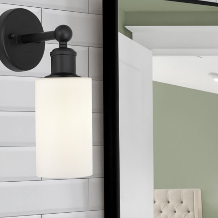 A large image of the Innovations Lighting 616-1W-11-4 Clymer Sconce Alternate Image