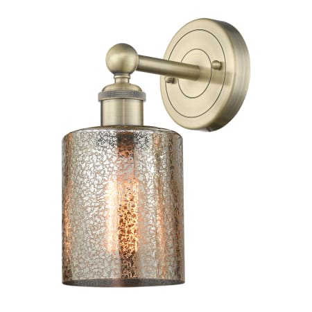 A large image of the Innovations Lighting 616-1W-12-5 Cobbleskill Sconce Antique Brass / Mercury