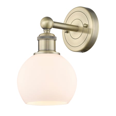 A large image of the Innovations Lighting 616-1W-11-6 Athens Sconce Antique Brass / Matte White