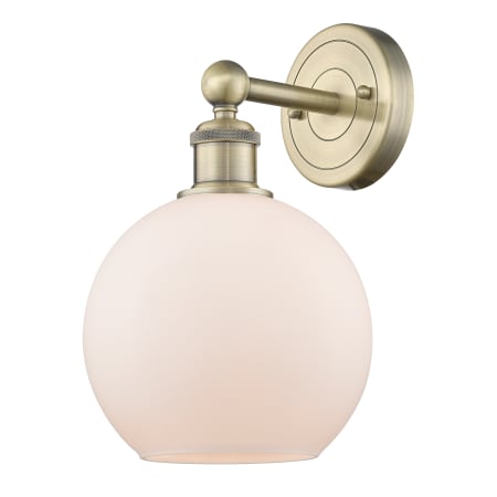 A large image of the Innovations Lighting 616-1W-13-8 Athens Sconce Antique Brass / Matte White