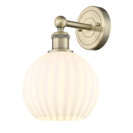 A large image of the Innovations Lighting 616-1W 12 8 White Venetian Sconce Antique Brass