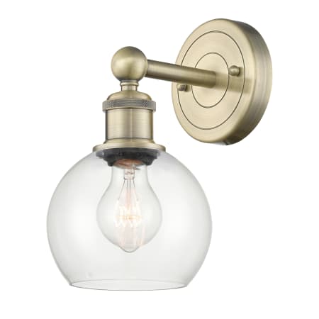 A large image of the Innovations Lighting 616-1W-11-6 Athens Sconce Antique Brass / Clear