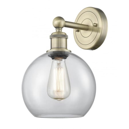 A large image of the Innovations Lighting 616-1W-13-8 Athens Sconce Antique Brass / Clear