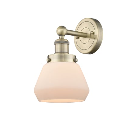 A large image of the Innovations Lighting 616-1W-10-7 Fulton Sconce Antique Brass / Matte White