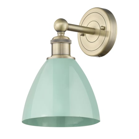 A large image of the Innovations Lighting 616-1W-12-8 Plymouth Sconce Antique Brass / Seafoam