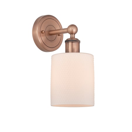 A large image of the Innovations Lighting 616-1W-12-5 Cobbleskill Sconce Antique Copper / Matte White
