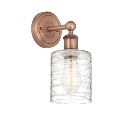 A large image of the Innovations Lighting 616-1W-12-5 Cobbleskill Sconce Antique Copper / Deco Swirl