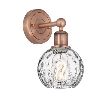 A large image of the Innovations Lighting 616-1W-11-6 Athens Water Glass Sconce Antique Copper / Clear Water Glass