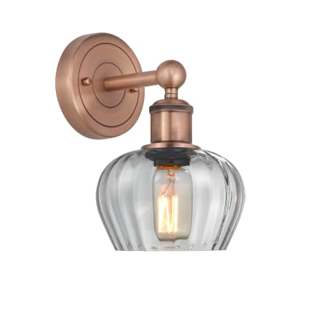 A large image of the Innovations Lighting 616-1W-10-7 Fenton Sconce Antique Copper / Clear