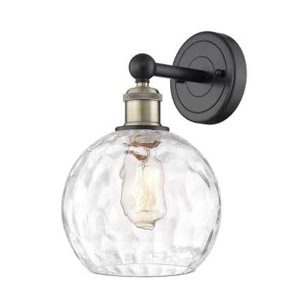 A large image of the Innovations Lighting 616-1W-13-8 Athens Sconce Black Antique Brass / Clear Water Glass