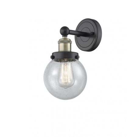 A large image of the Innovations Lighting 616-1W-10-7 Beacon Sconce Black Antique Brass / Seedy