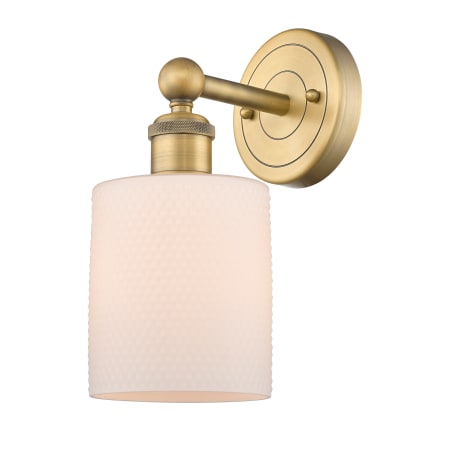A large image of the Innovations Lighting 616-1W-12-5 Cobbleskill Sconce Brushed Brass / Matte White