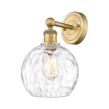 A large image of the Innovations Lighting 616-1W-13-8 Athens Sconce Brushed Brass / Clear Water Glass