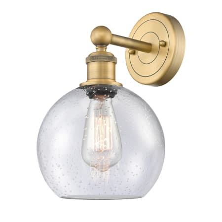 A large image of the Innovations Lighting 616-1W-13-8 Athens Sconce Brushed Brass / Seedy