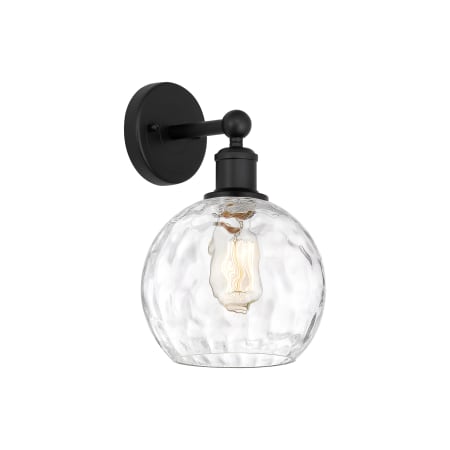 A large image of the Innovations Lighting 616-1W-13-8 Athens Sconce Matte Black / Clear Water Glass