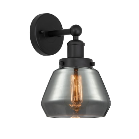 A large image of the Innovations Lighting 616-1W-10-7 Fulton Sconce Matte Black / Plated Smoke