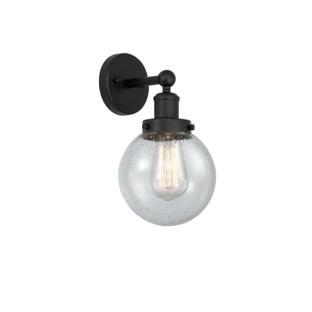 A large image of the Innovations Lighting 616-1W-10-7 Beacon Sconce Matte Black / Seedy