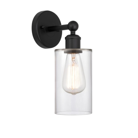 A large image of the Innovations Lighting 616-1W-11-4 Clymer Sconce Matte Black / Clear