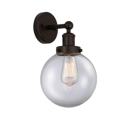 A large image of the Innovations Lighting 616-1W-10-7-L Beacon Sconce Oil Rubbed Bronze / Clear