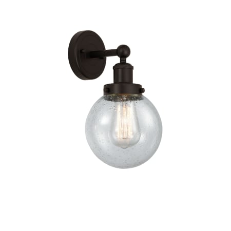 A large image of the Innovations Lighting 616-1W-10-7 Beacon Sconce Oil Rubbed Bronze / Seedy