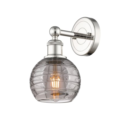 A large image of the Innovations Lighting 616-1W 10 6 Athens Deco Swirl Sconce Polished Nickel / Light Smoke Deco Swirl
