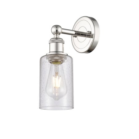 A large image of the Innovations Lighting 616-1W-11-4 Clymer Sconce Polished Nickel / Seedy