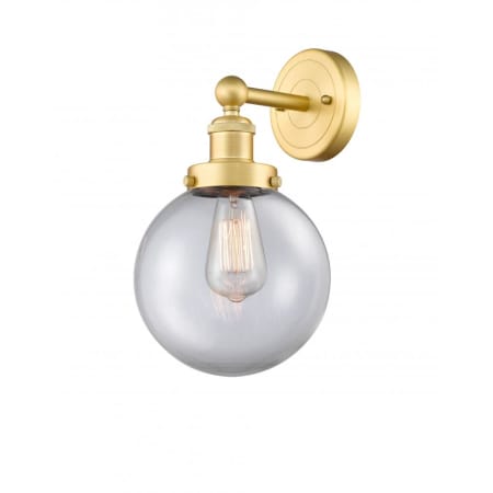 A large image of the Innovations Lighting 616-1W-10-7-L Beacon Sconce Satin Gold / Clear