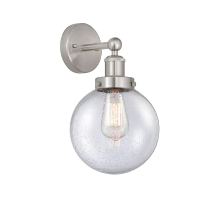 A large image of the Innovations Lighting 616-1W-10-7-L Beacon Sconce Brushed Satin Nickel / Seedy