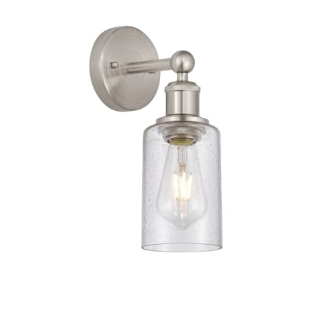 A large image of the Innovations Lighting 616-1W-11-4 Clymer Sconce Brushed Satin Nickel / Seedy