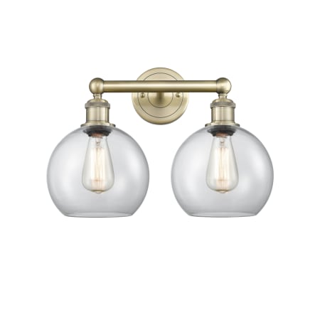 A large image of the Innovations Lighting 616-2W-13-17 Athens Vanity Antique Brass / Clear