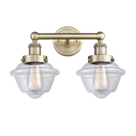 A large image of the Innovations Lighting 616-2W-10-16 Oxford Vanity Antique Brass / Clear