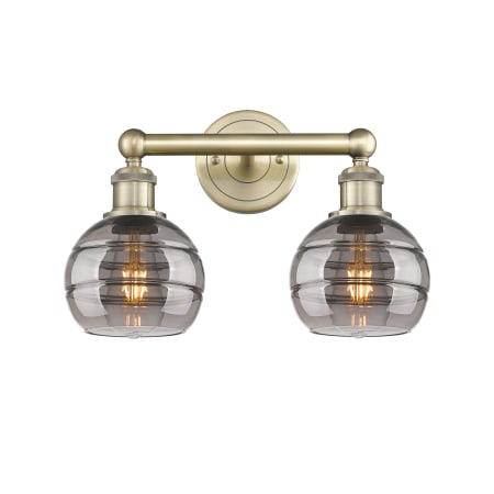 A large image of the Innovations Lighting 616-2W 10 15 Rochester Vanity Antique Brass / Light Smoke