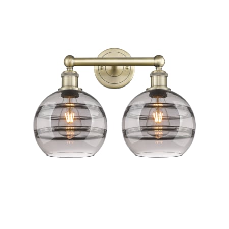 A large image of the Innovations Lighting 616-2W 12 17 Rochester Vanity Antique Brass / Light Smoke