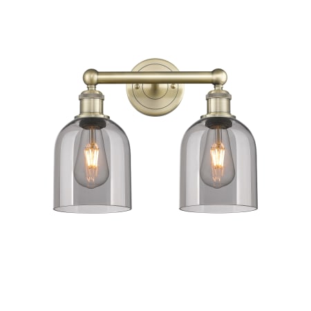 A large image of the Innovations Lighting 616-2W 12 15 Bella Vanity Antique Brass / Light Smoke