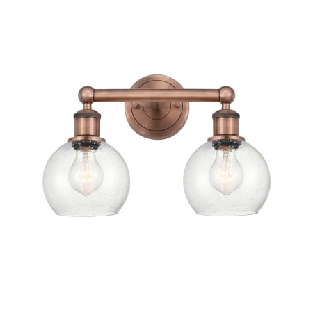 A large image of the Innovations Lighting 616-2W-11-15 Athens Vanity Antique Copper / Seedy