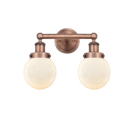 A large image of the Innovations Lighting 616-2W-10-16 Beacon Vanity Antique Copper / Matte White