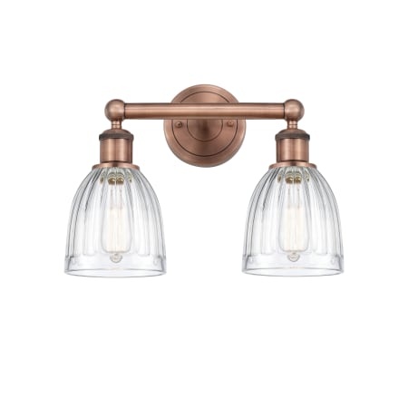 A large image of the Innovations Lighting 616-2W-12-15 Brookfield Vanity Antique Copper / Clear