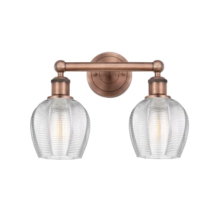 A large image of the Innovations Lighting 616-2W-11-15 Norfolk Vanity Antique Copper / Clear