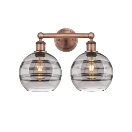 A large image of the Innovations Lighting 616-2W 12 17 Rochester Vanity Antique Copper / Light Smoke