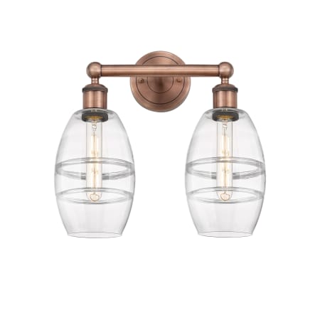 A large image of the Innovations Lighting 616-2W 10 15 Vaz Vanity Antique Copper / Clear