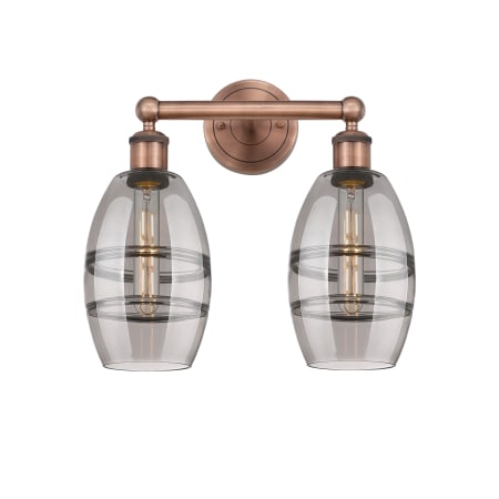 A large image of the Innovations Lighting 616-2W 10 15 Vaz Vanity Antique Copper / Light Smoke